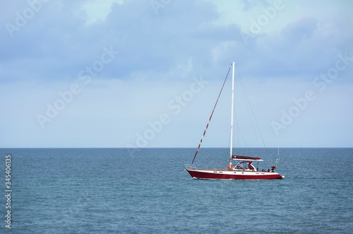 Small red and white yacht in the Black Sea