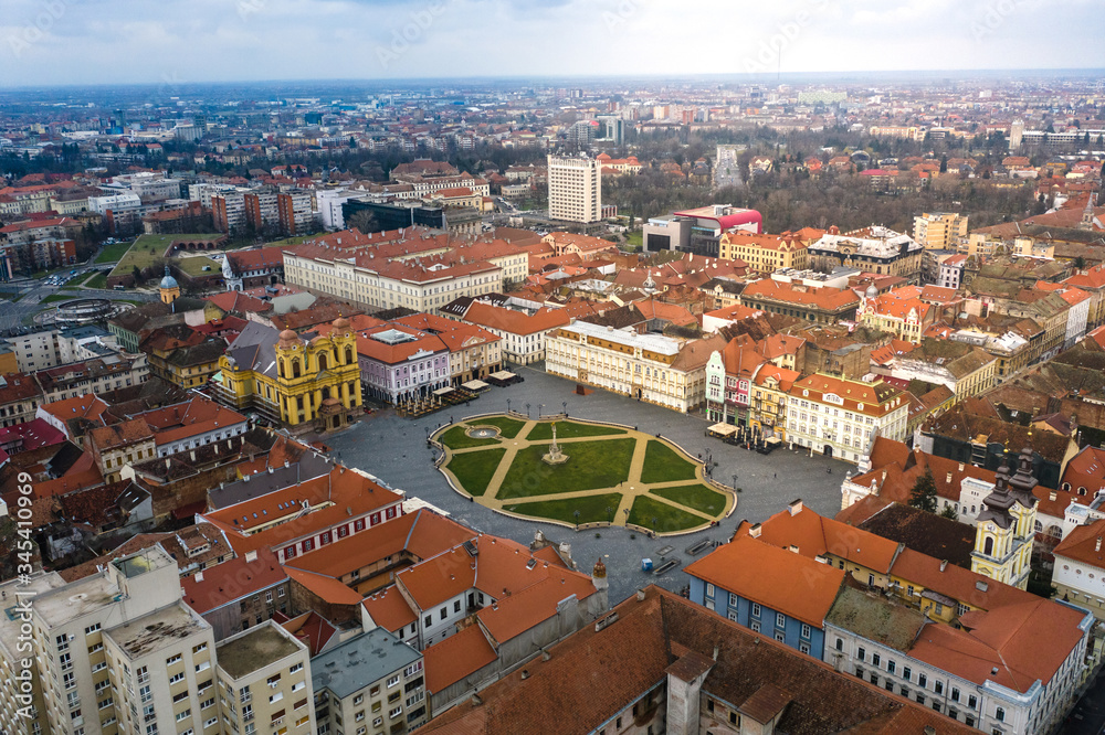 Beautiful cloudy sunset over Union Square - Piata Unirii Timisoara. Aerial view from Timisoara taken by a professional drone