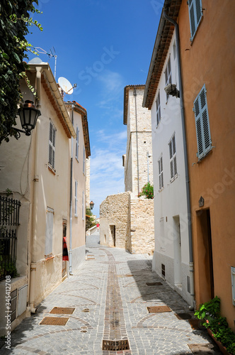 Narrow street in old town of Antibes, French Riviera, Provence, France