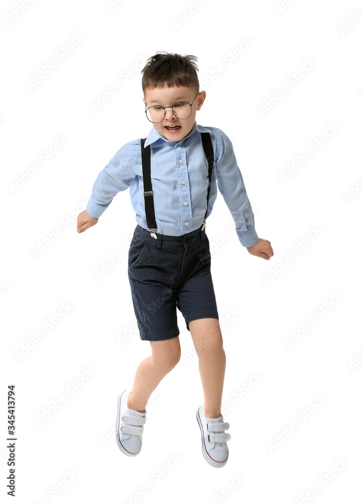 Cute jumping little boy on white background Cute jumping little boy on white background