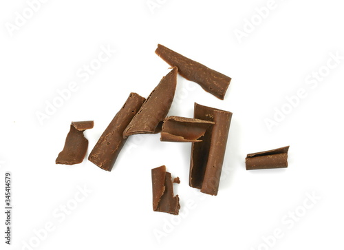 Chocolate Curls Isolated On White Background. Group of chocolate shavings. CHOCOLATE ROLL. photo