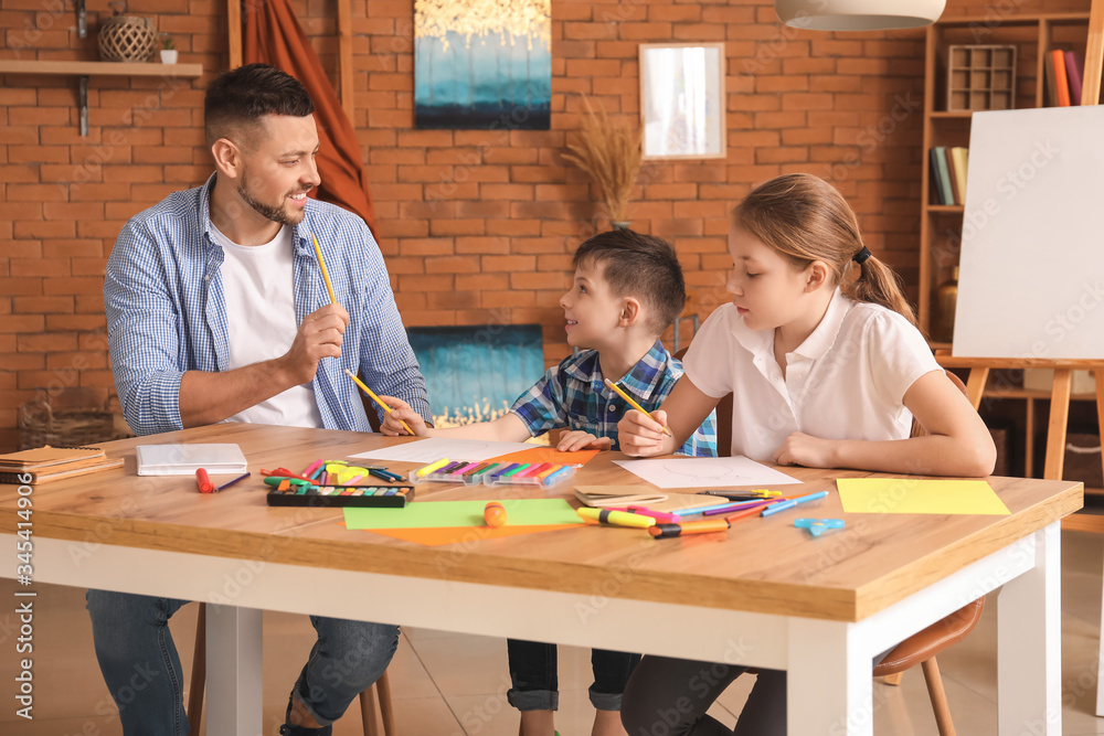Drawing teacher giving optional classes at school Drawing teacher giving optional classes at school