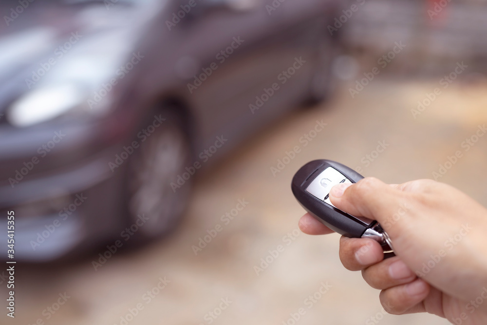 Hand press remote car.Concept finance. Hand press remote car.Concept finance.