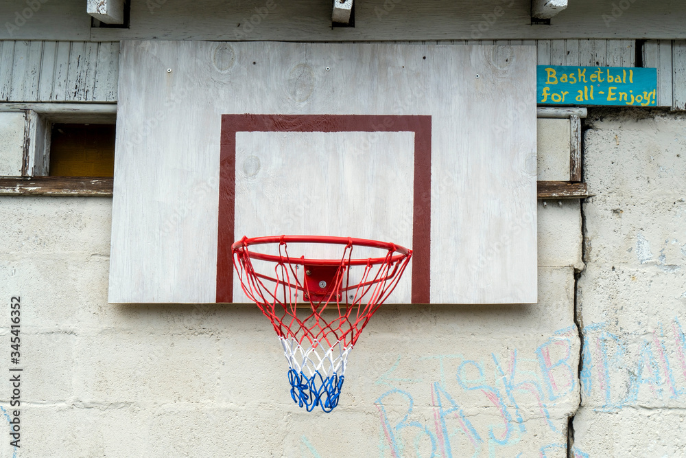 Basketball hoop set up in alley. Free for everyone to play.