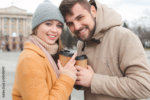 Young couple drinking coffe...