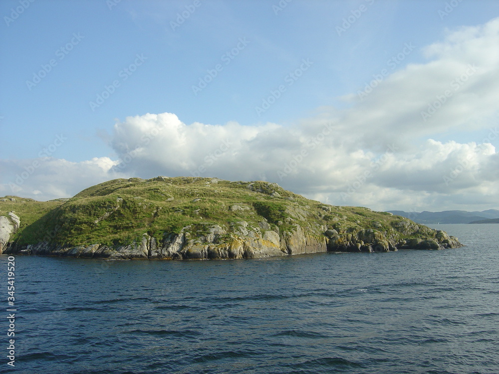 View of a rock in a Norwegian fjord.
