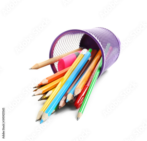 Holder with stationery on white background