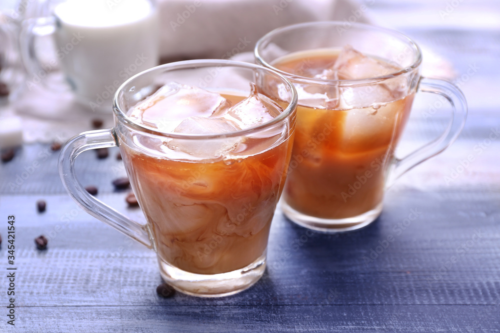 Cups of tasty iced coffee on table Cups of tasty iced coffee on table
