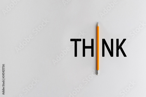 The interactive photo composition of the orange pencil replaces the black words of creative thinking used for presentations in the field of education  business or creativity.