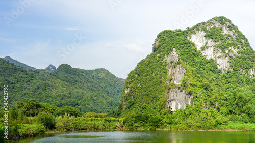 A beautiful landscape of green hills, mountains and river in YingDe, China