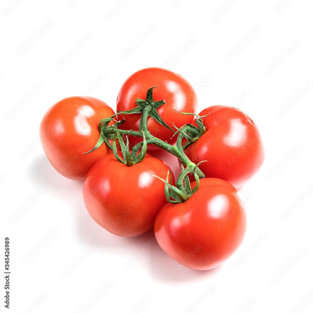 five fresh tomatoes with green leaves isolated on a white background. Juicy red tomatoes. Ripe vegetables. Organic product. five fresh tomatoes with green leaves isolated on a white background. Juicy red tomatoes. Ripe vegetables. Organic product.
