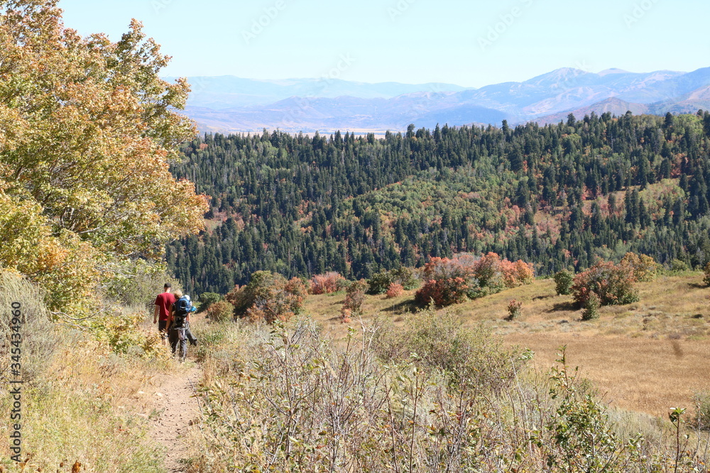 Hikers descend into the wilderness of Morgan county, Utah Hikers descend into the wilderness of Morgan county, Utah