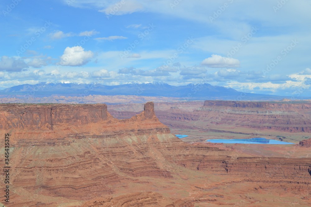 Viewpoint overlooking Potash Ponds and the La Sal mountains in the distance at Dead Horse Point, Utah