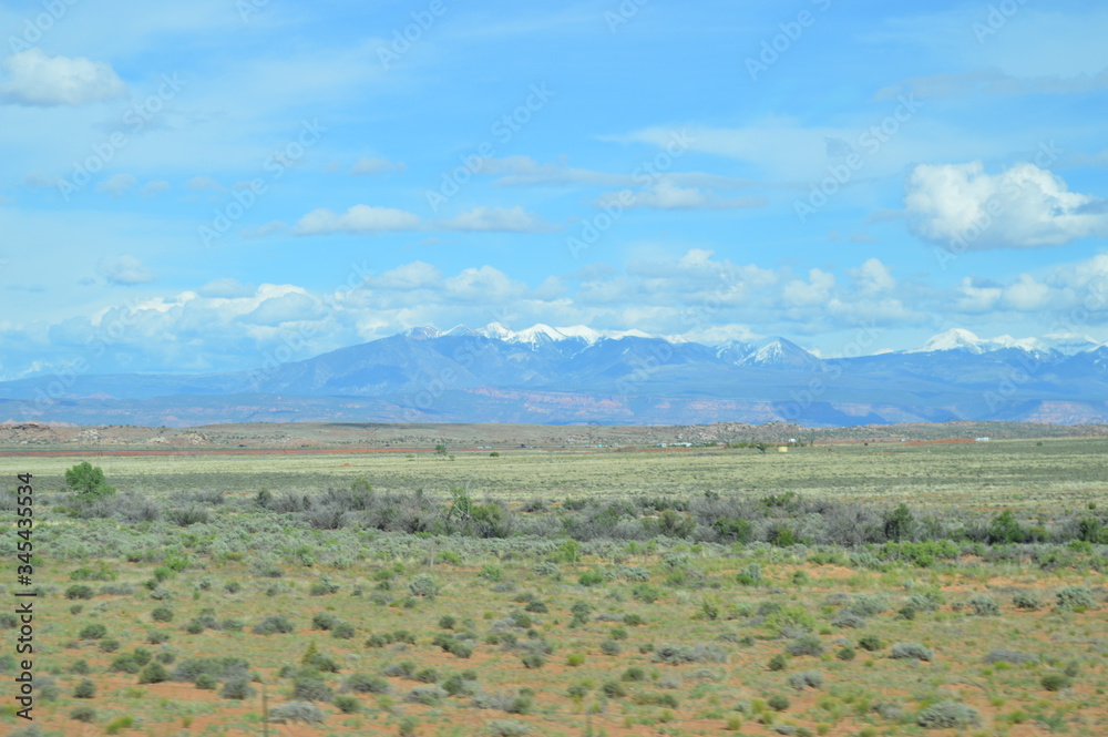 Sagebrush valley overlooking the La Sal Mountain range near Moab, Utah