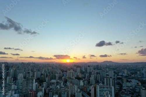 Panoramic aerial view of sunset in the city. Great city life scene.