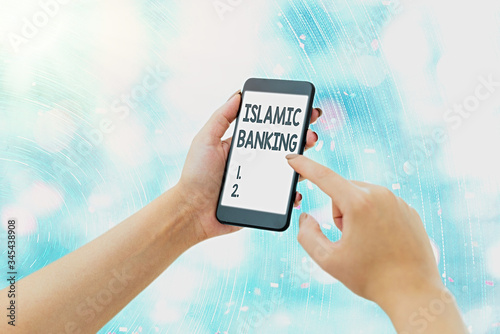 Conceptual hand writing showing Islamic Banking. Concept meaning Banking system based on the principles of Islamic law photo