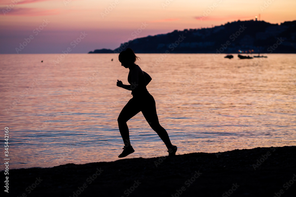 woman doing sports on the beach woman doing sports on the beach