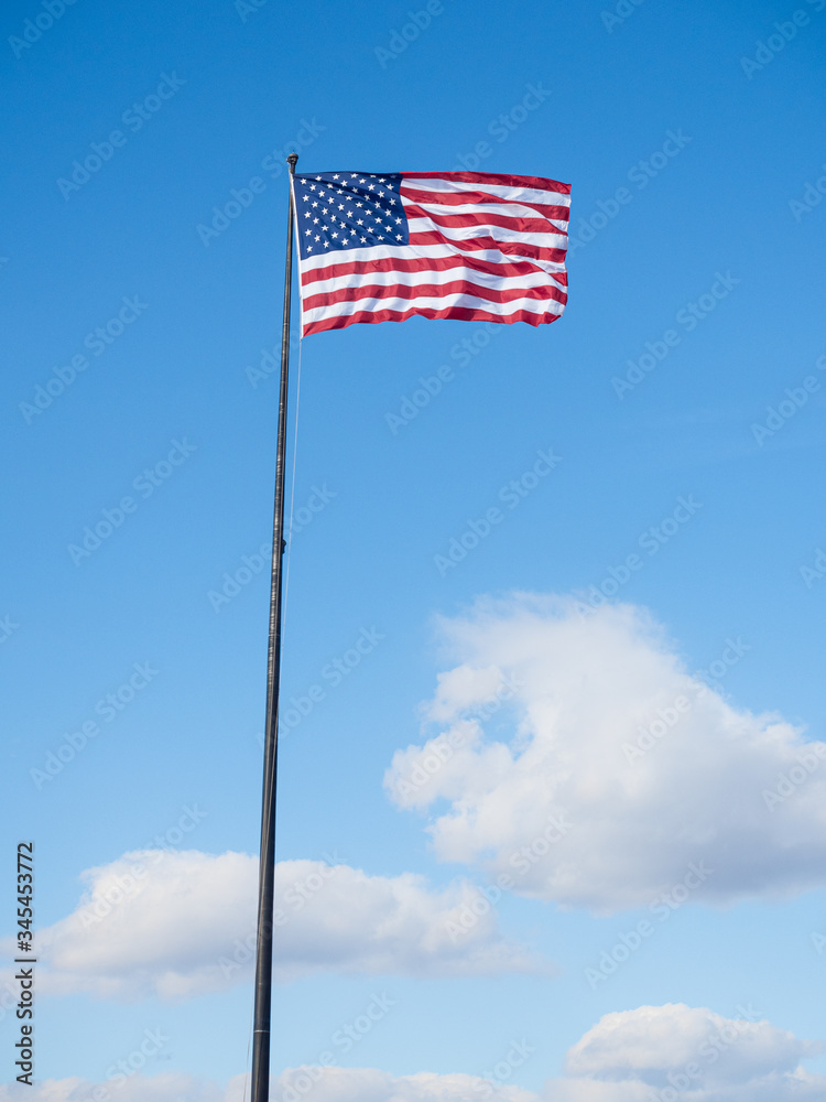 american national flag on blue sky