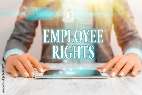 Writing note showing Employee Rights. Business concept for All employees have basic rights in their own workplace photo