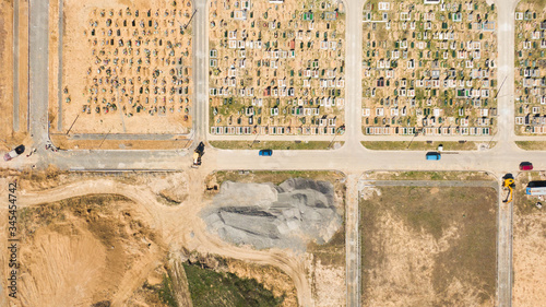 Bild auf Leinwand Aerial photo of new cemetery graveyard showing the headstones and tombstones of