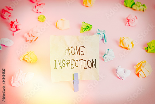 Conceptual hand writing showing Home Inspection. Concept meaning Examination of the condition of a home related property Colored crumpled papers empty reminder pink floor clothespin photo