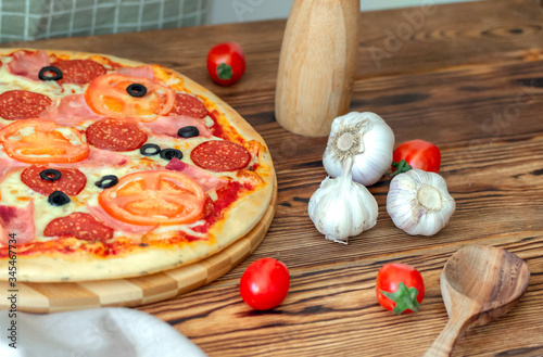 pizza on a wooden table, background photo