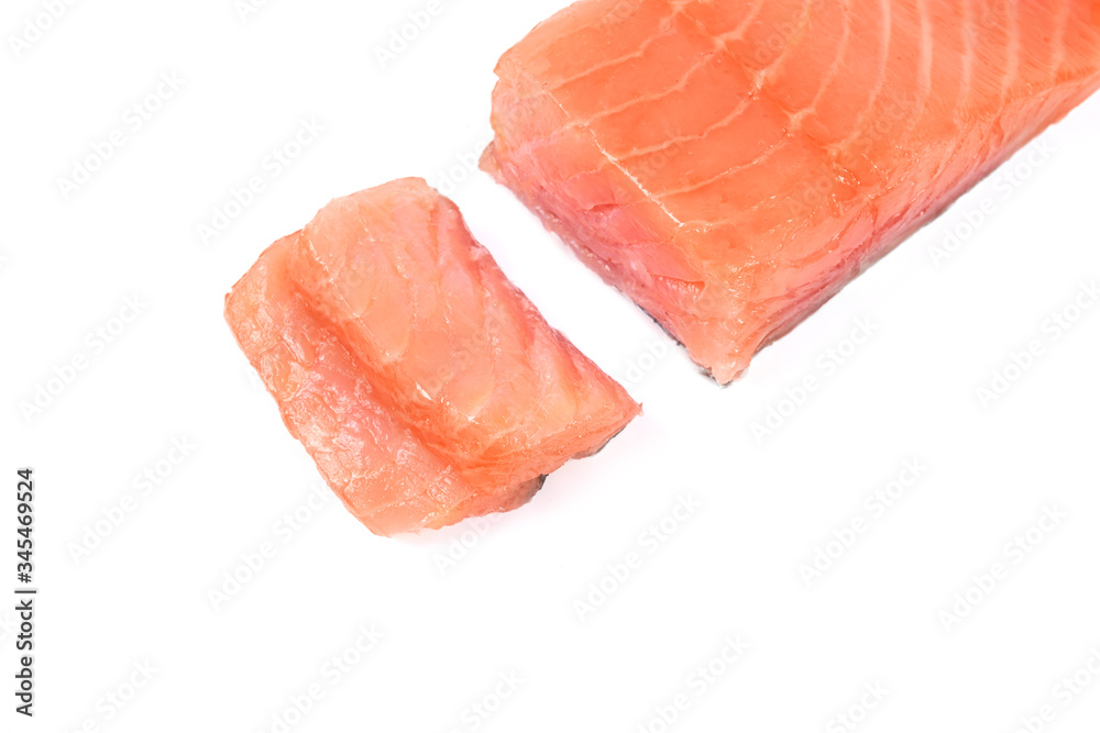 Sliced salmon fillet isolated on white background. Sliced salmon fillet isolated on white background.