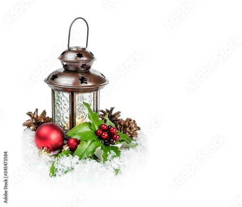 Lantern and holly berries o...