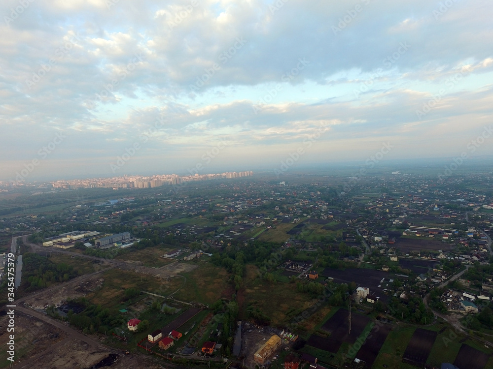 Aerial view of the saburb landscape (drone image). Near Kiev. Early morning. Sunrise time.