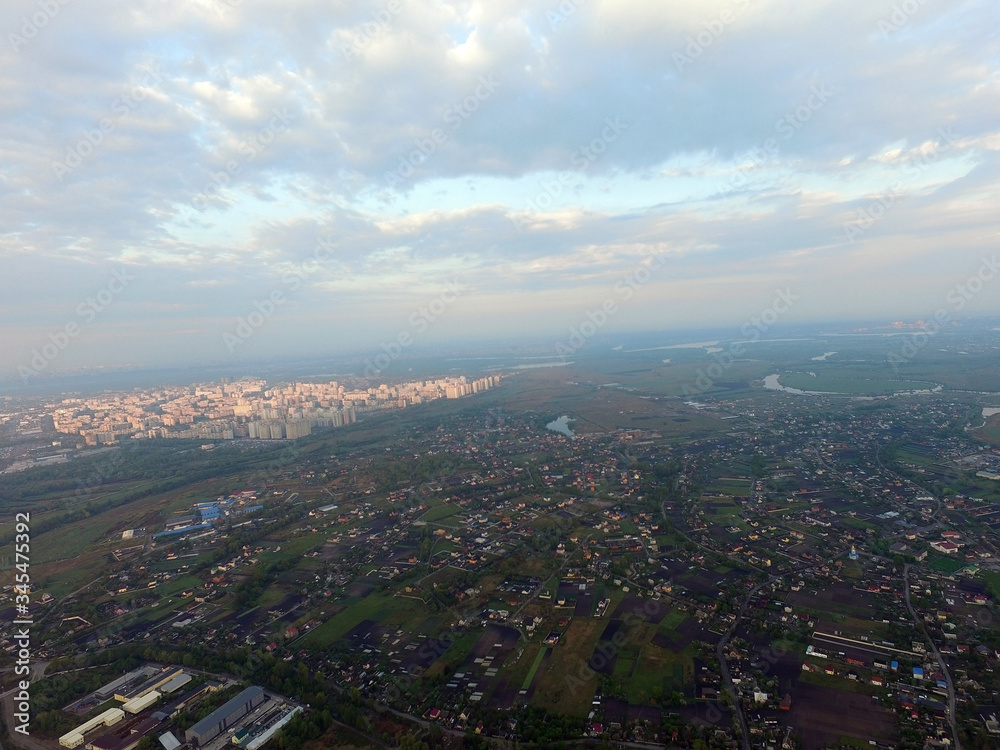 Aerial view of the saburb landscape (drone image). Near Kiev. Early morning. Sunrise time.