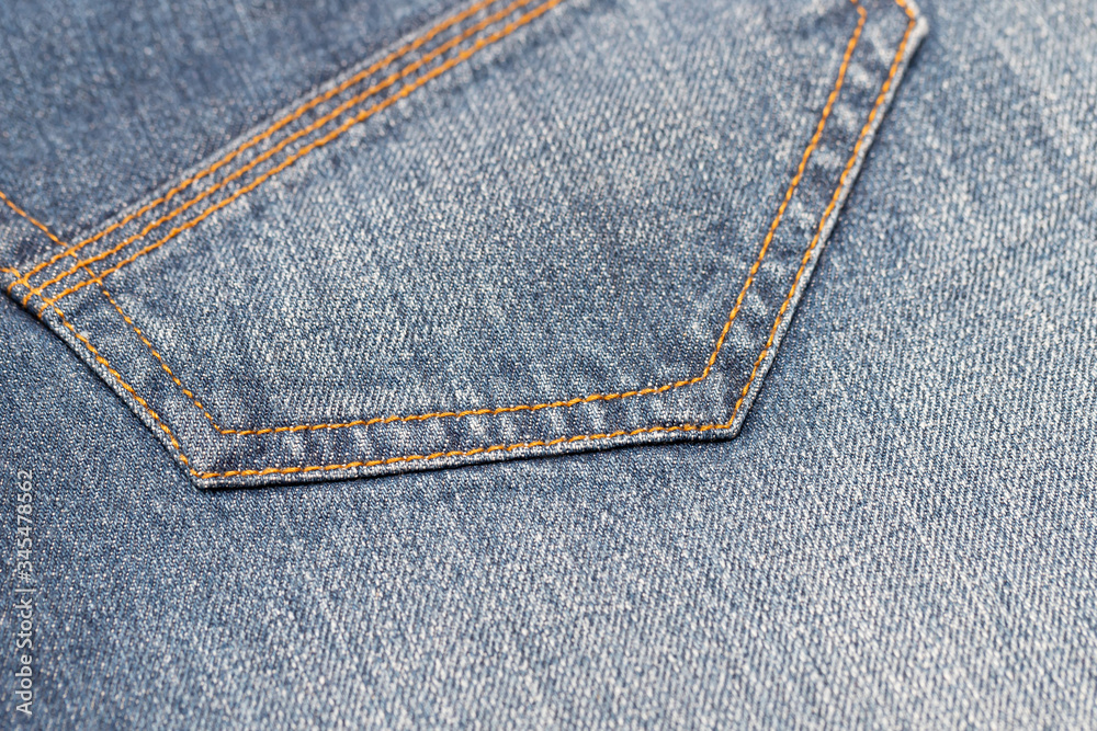 Close-up of blue denim texture. Denim jeans background