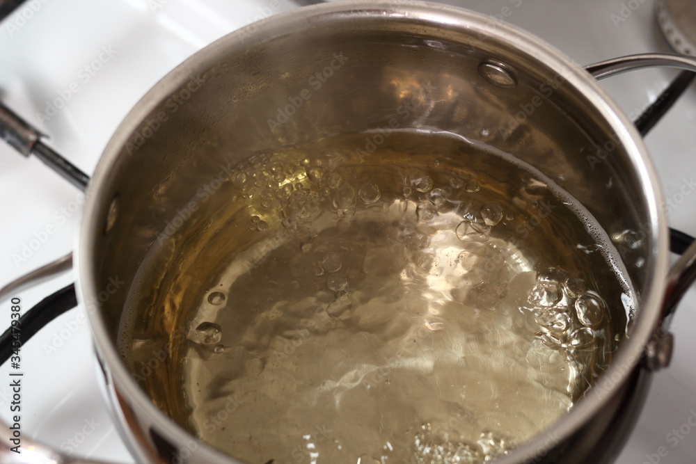 Boiling Cider in Pan on Gas Stove. Making Cider Pie Series. Boiling Cider in Pan on Gas Stove. Making Cider Pie Series.