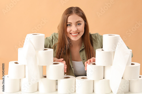 Woman with heap of toilet p...