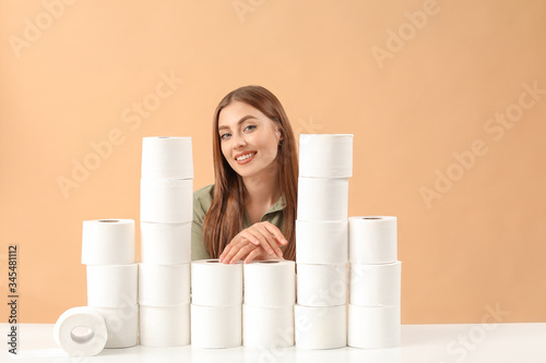 Woman with heap of toilet p...