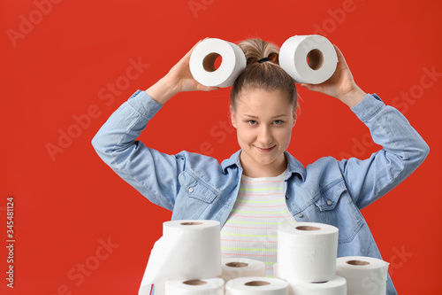 Woman with heap of toilet p...