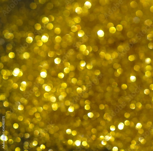 Gold bokeh, blured, defocused party, Christmas, holiday background. Copy space