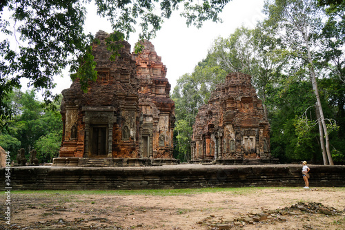 Preah Ko, Angkor Wat temple in Cambodia, dilapidated red brick structure, beautiful carved building, three ancient towers