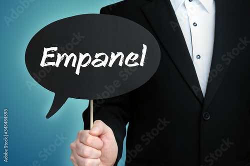 Empanel. Lawyer in suit holds speech bubble at camera. The term Empanel is in the sign. Symbol for law, justice, judgement