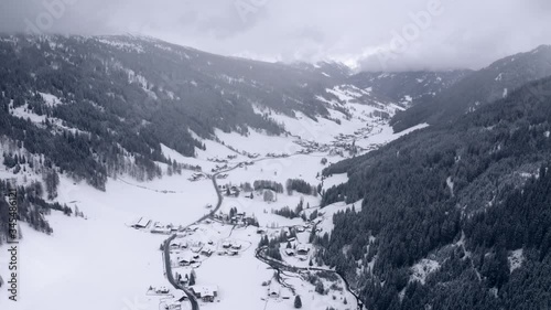 Drone flying through the wipptal in Austria
snowy atmosphere. photo