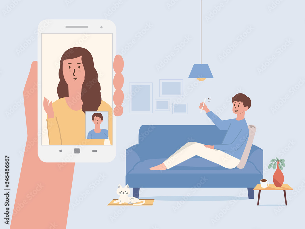 Men using a smartphone for video calls with his colleague from home. Hand holding white smartphone have women on the mobile screen greet her friend. Illustration of New normal and social distancing. Men using a smartphone for video calls with his colleague from home. Hand holding white smartphone have women on the mobile screen greet her friend. Illustration of New normal and social distancing.