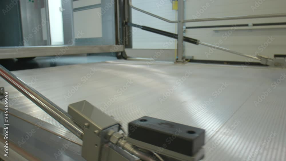 Trailer tailgate dolly movement from left to right. Empty cargo truck loading door Trailer tailgate dolly movement from left to right. Empty cargo truck loading door