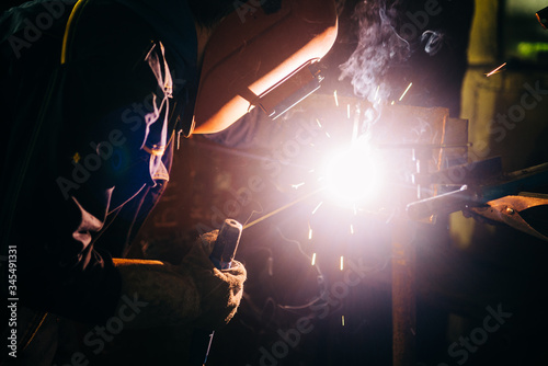 Industry worker welding at work