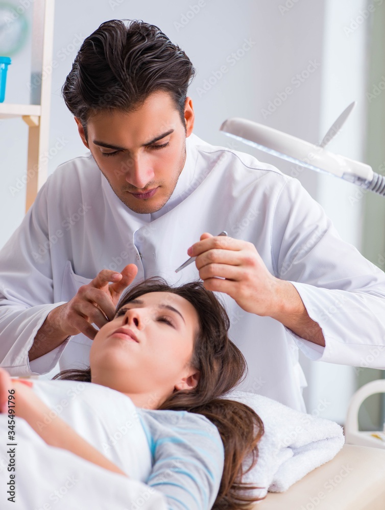 Woman visiting doctor cosmetologyst in beauty concept Woman visiting doctor cosmetologyst in beauty concept