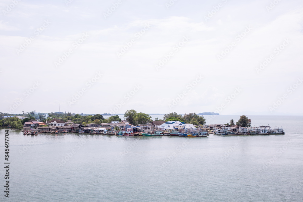 Chanthaburi Thailand - Oct, 2019 ; many fisherman ship and rural village at port on the river in Chanthaburi Thailand .