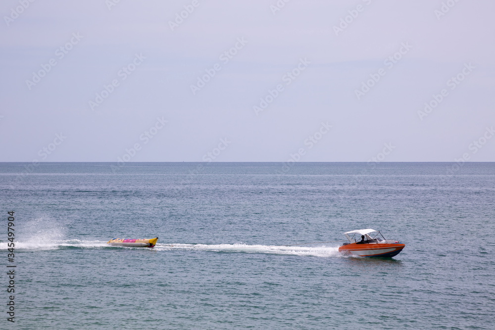 Fototapeta premium jet ski and banana boat on the sea in summer holiday .