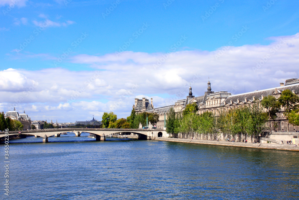 View of the Louvre palace and bridges across the Seine River, Paris, France