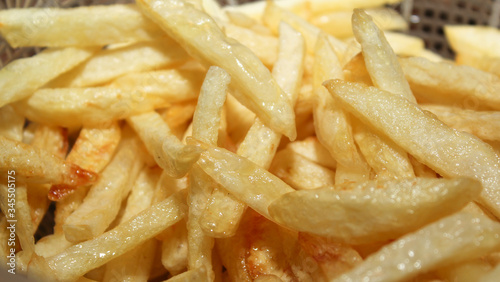 a pile of french fries on as a background