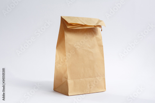 brown paper craft bag on a white background