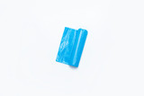 Blue trash bag on an isolated white background. The concept of cleaning, garbage removal. Flat lay, top view