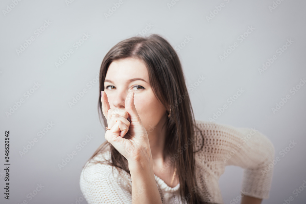 girl shows something very small girl shows something very small